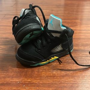 Toddler Jordan 5. Black , turquoise, and yellow. 8c.